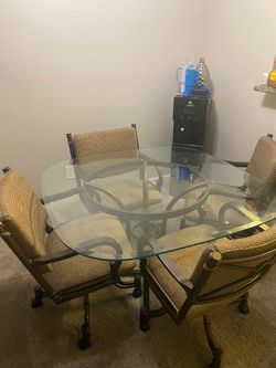Glass dining table with 4 chairs