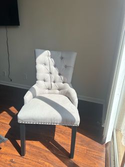 Grey upholstered chair( accent chair )