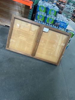 Dual cabinet corkboard