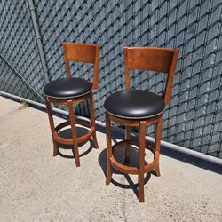 Two Swivel Bar Stools 30"