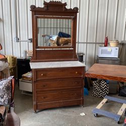 Antique Dresser With Marble Top And Three Drawers And Wheels