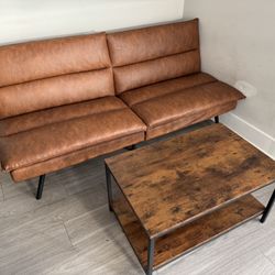 Futon Couch And Two Coffee Tables