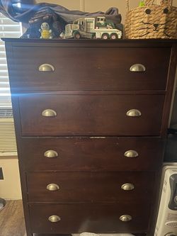 Brown chest of drawers