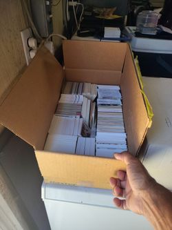 2 Boxes of Baseball and Hockey base cards with some rookies