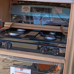 Brand New Gas Stove  And Microwave 