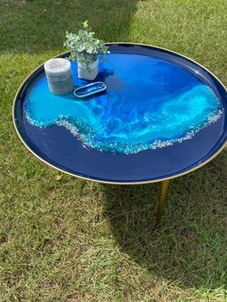 Beautiful coffee table pier one , modern ocean epoxy with fire glass