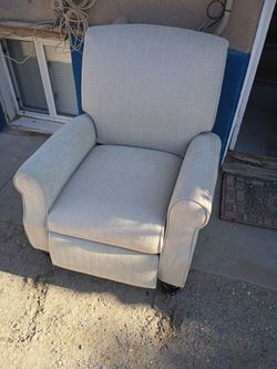 Brand used beige loveseat recliner