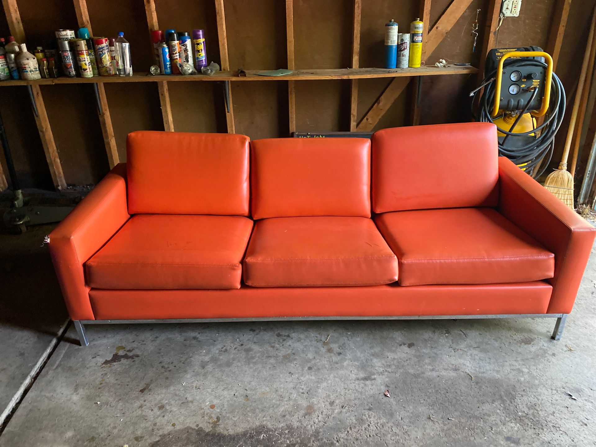 Mcm orange and chrome couch