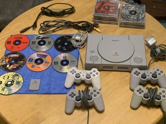 Play station 1 + 18 GAMES BUNDLE