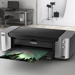 Canon PIXMA PRO-100 Professional Photo Printer - Full ink already installed plus a set of cartridges