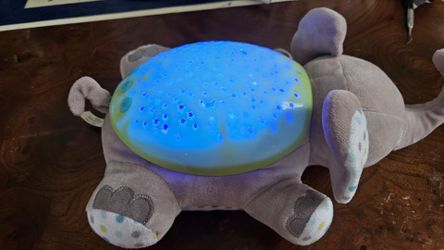 SwaddleMe Slumber Buddies Elephant Soother Musical Projector Night Light/Timer, firm.