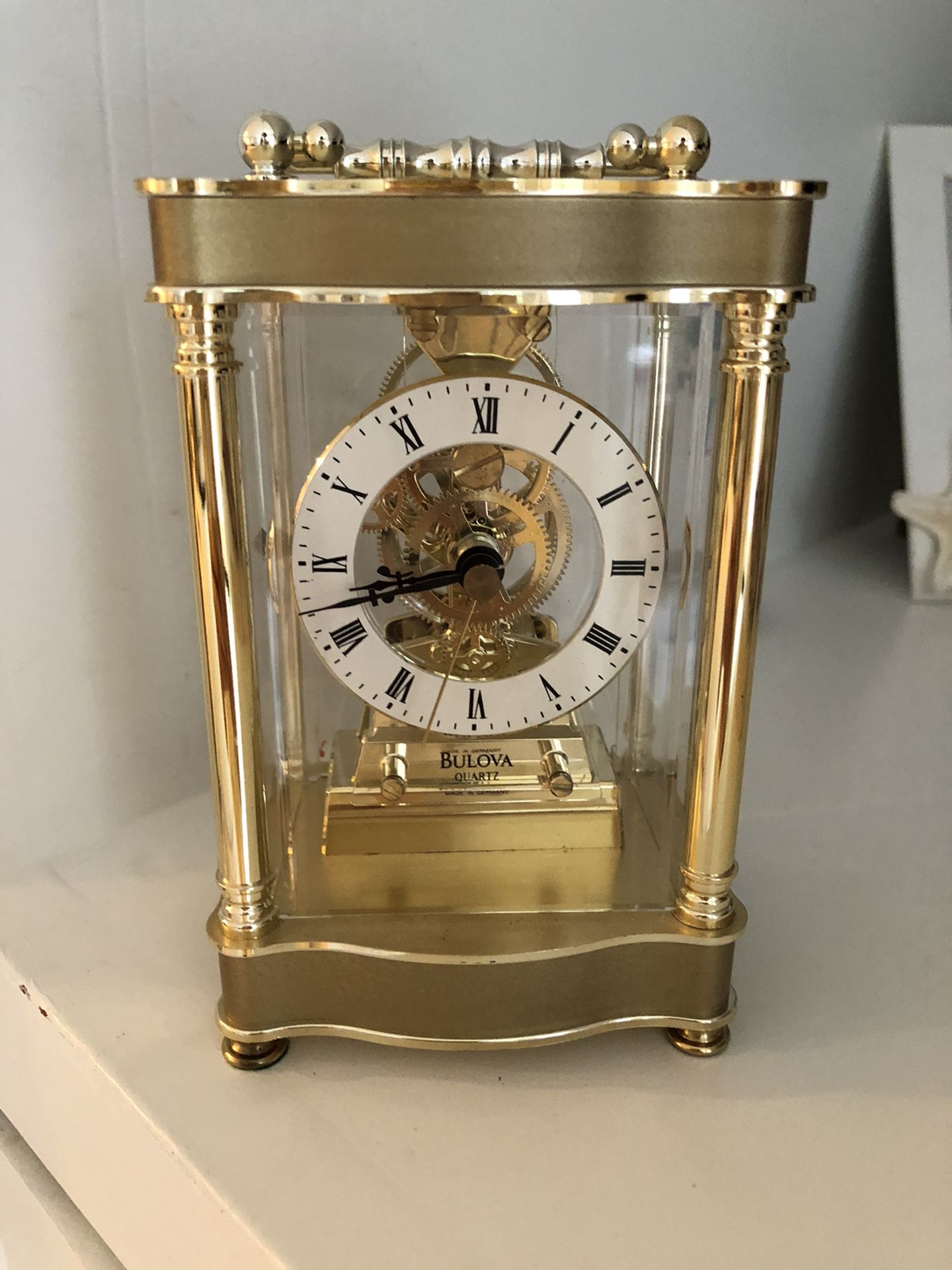 Gold Bulova clock