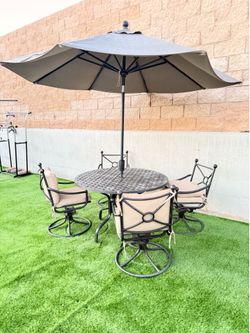Patio table set with umbrella