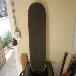 31 inch wooden skateboard unknown make due to sticker collection on bottom