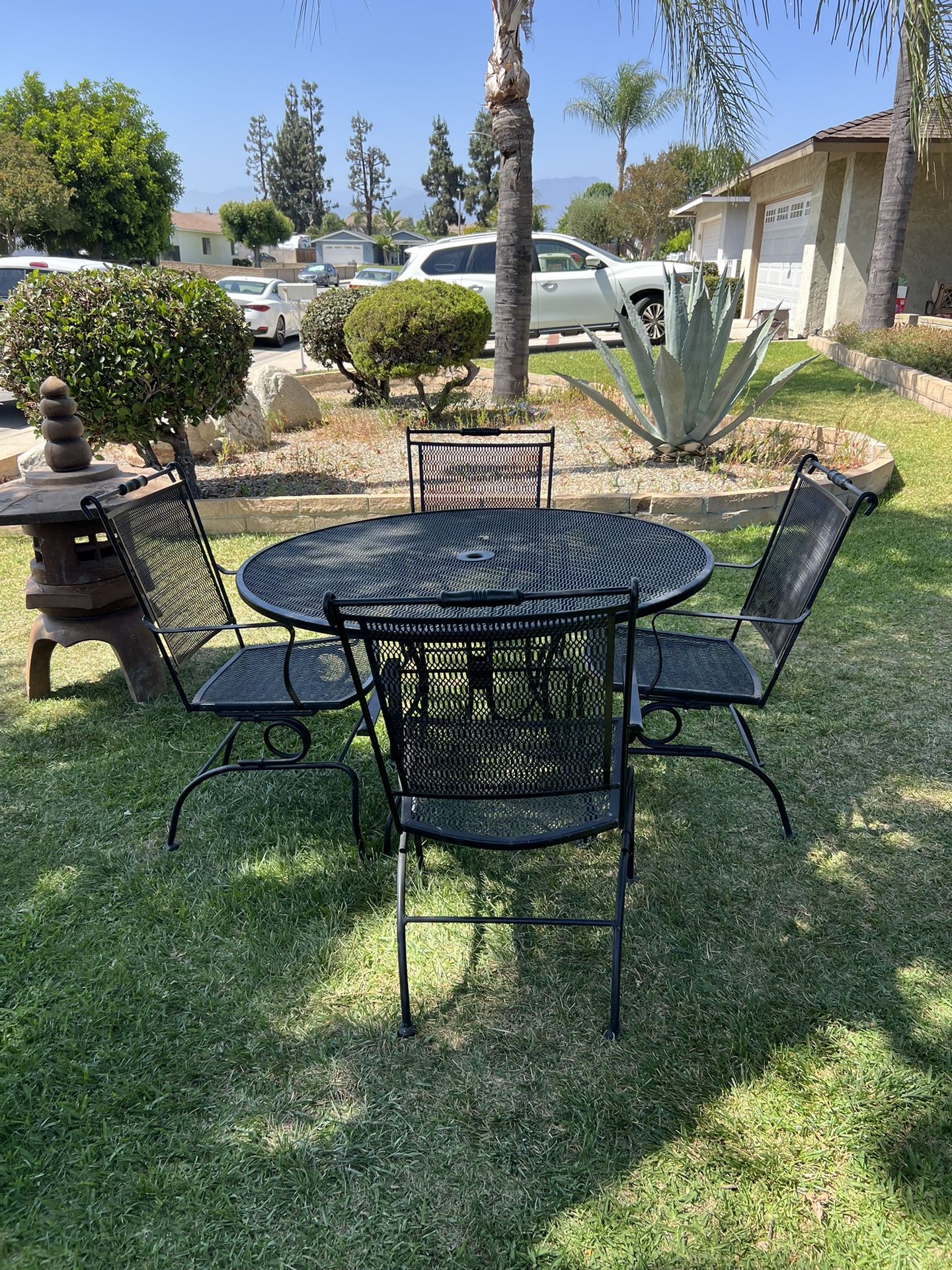 Wrought Iron Patio Set 54” Table and Four Chairs in Satin Black Finish Very Solid In Excellent Condition