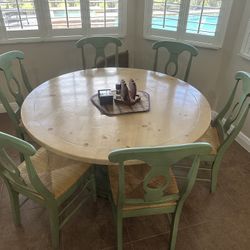 solid 54” dining table and 6 chairs
