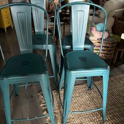 4 counter height teal metal bar stools