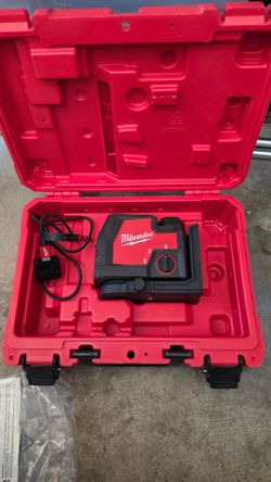 Milwaukee crosshair, laser level and a milwaukee pole stand
