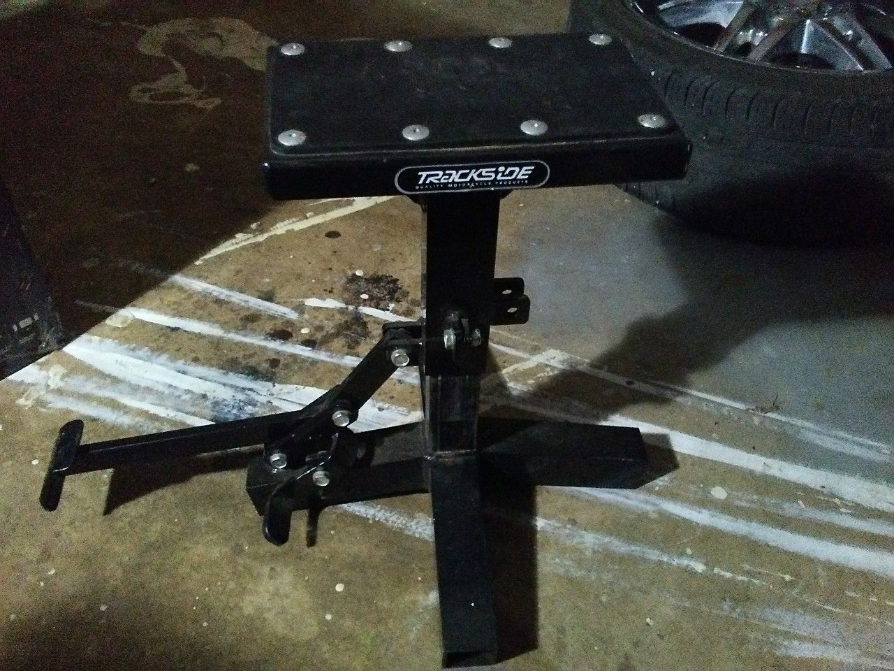 Trackside motorcycle stand/lift