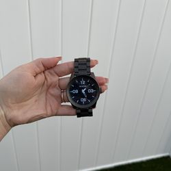 a Nixon Corporal Stainless Steel (SS) watch