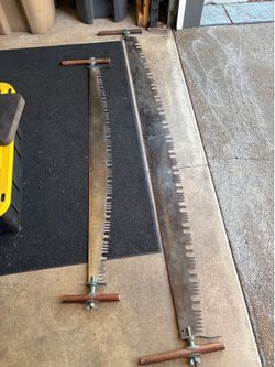 Old two-man crosscut saws.