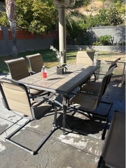 Patio table and 6 chairs
