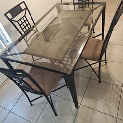 Glass Top Table (With Bottom Shelf) And 4 Matching Chairs 