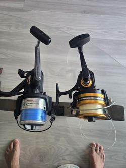 Model 6500 Shimano baitrunner and penn 8500 SS spinning reel