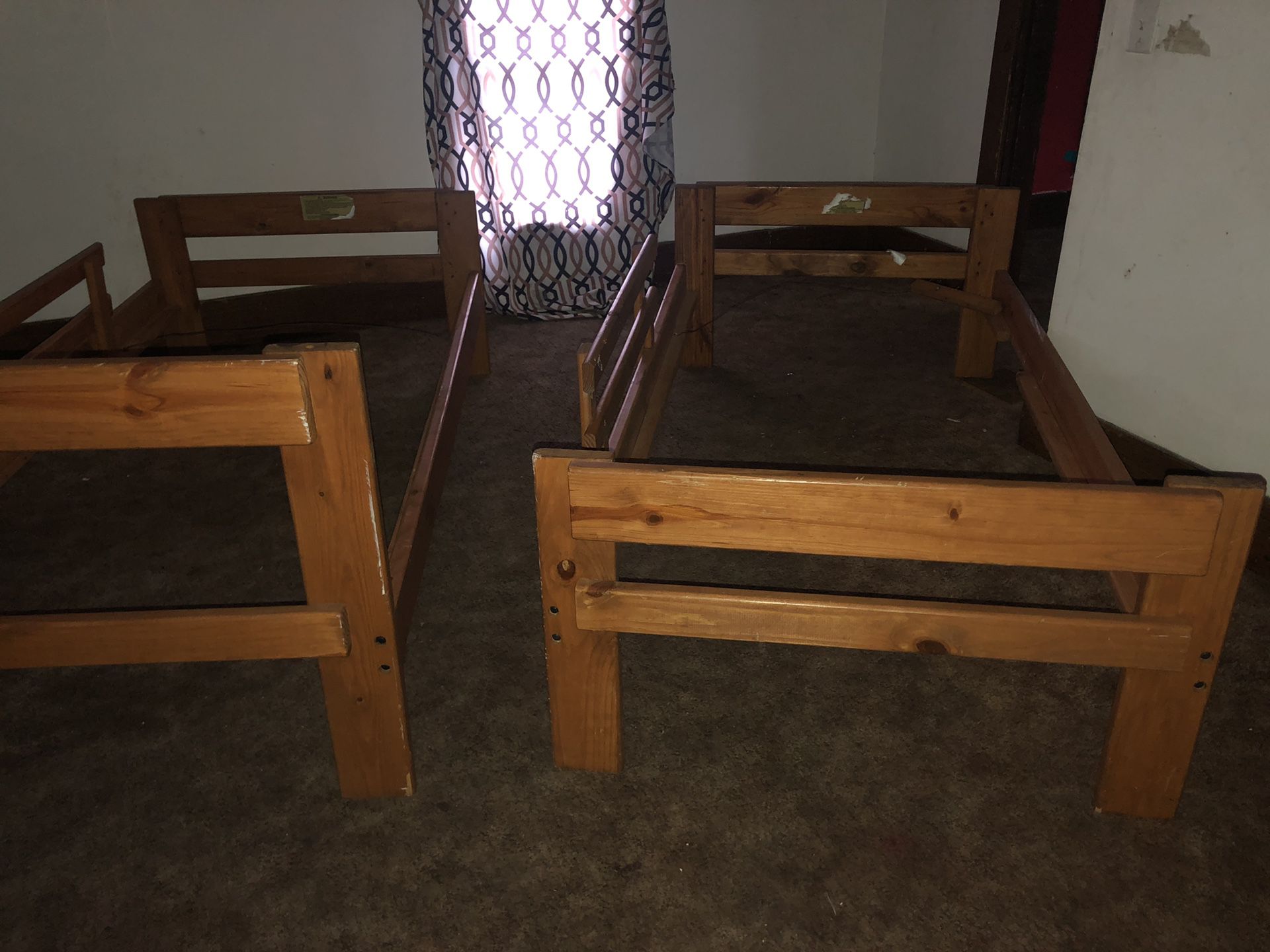 Stackable bunk beds or two wooden frames both for $55 pick up only