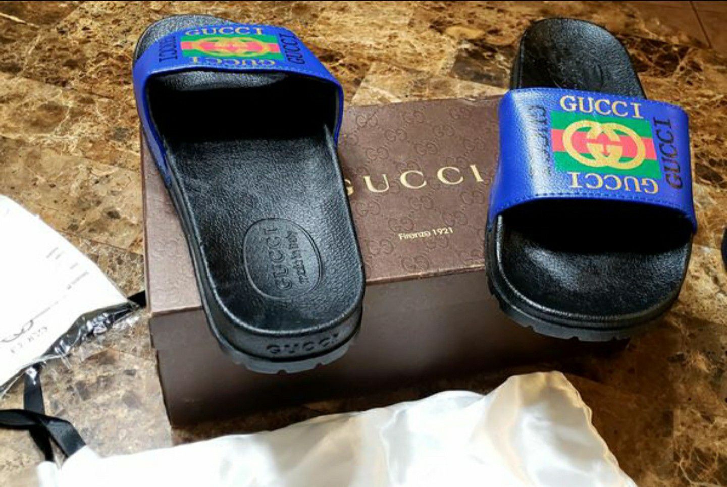 Gucci slides.
