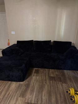 Black ribbed sectional sofa