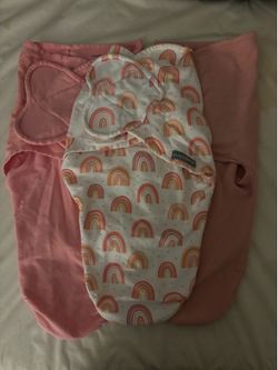Baby girl swaddles