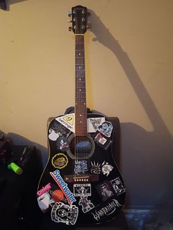 Johnson acoustic guitar , w/stickers