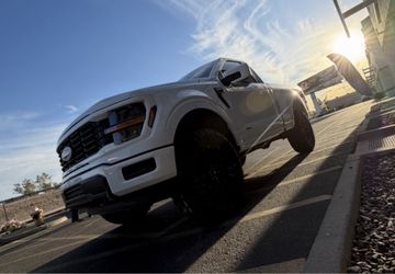 Ford F150 wheels tires leveling and lift kits intakes side steps lights bed covers Installs. (we finance)
