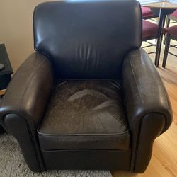 Two leather club chairs