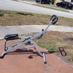 Sunny Health & Fitness Row-N-Ride PRO Squat Assist Trainer