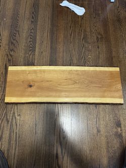 Handmade wooden charcuterie board with live bark edges and lacquer finish 32.5” long 11” wide .75” thick