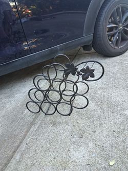 Cast Iron Wine Bottles Holder  $5
