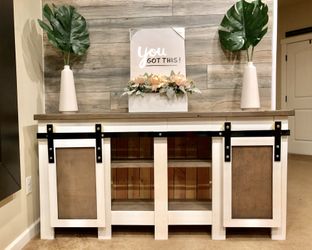 Farmhouse style sliding barndoor console table and storage