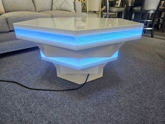 Brand new 48" octagon color changing multi LED coffee table with Bluetooth speakers and wireless charging