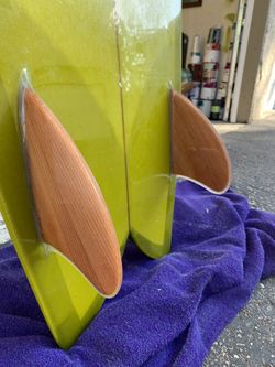 5’10” fish glassed on redwood fins
