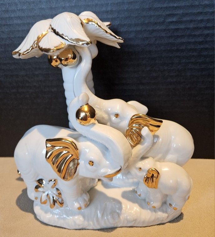 Porcelain Elephant Family Under Tree