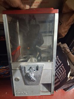 Toy vending machine. Fits 2 inch capsules. Needs work. Asking $50 or best offer.