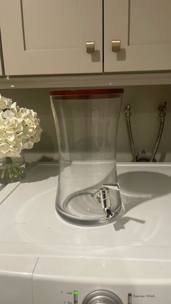 Glass drink dispenser.