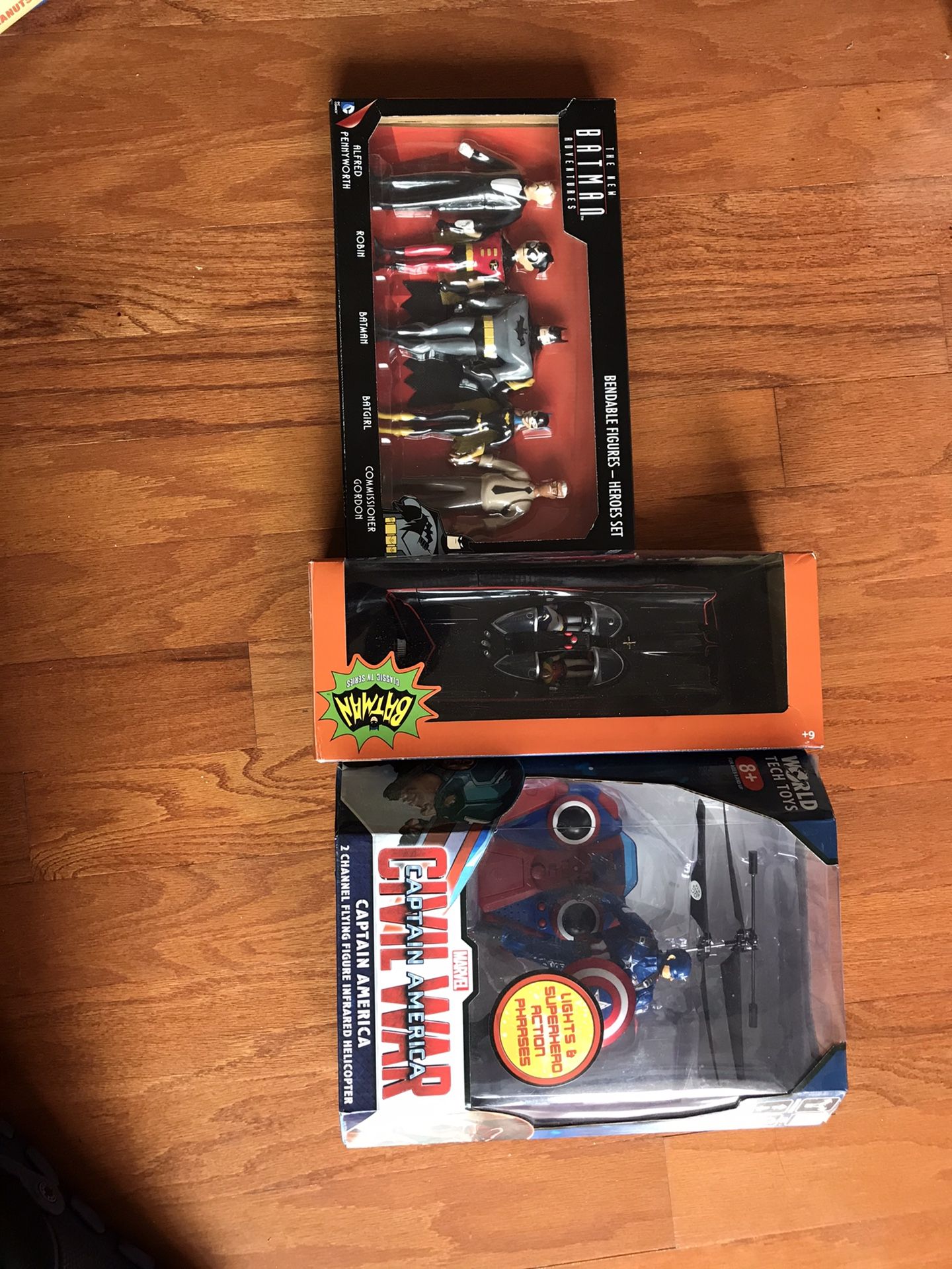 Batman figurines and captain America drone