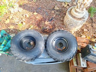 pair of new atv wheels and tires at22x10-10
