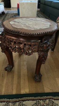 Early 1900’s carved oriental table