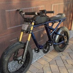 half built dialed Super 73 rx adventure talaria surron 