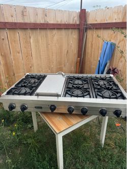 Cooktop range 6 burners . Range hood included.