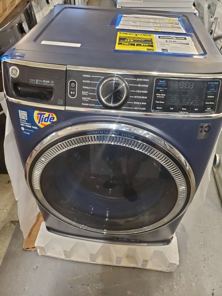 Washer GE  new open box small scratches..and little dent ,,but new  working perfect warranty..$650